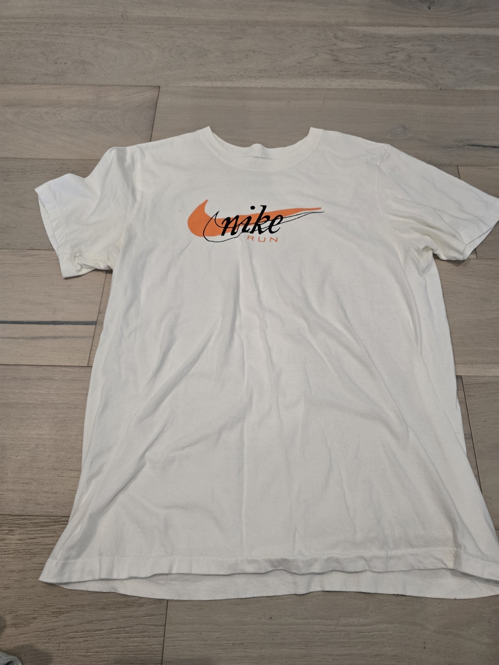 Nike Men’s White Short Sleeve Tee with Orange Swoosh
